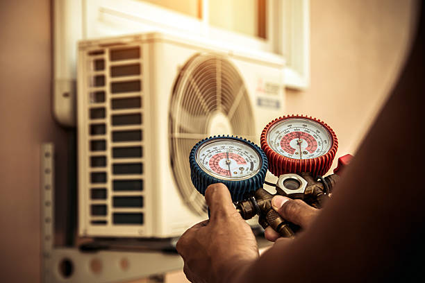 Professional Air Conditioning Service technician working in Forest, VA